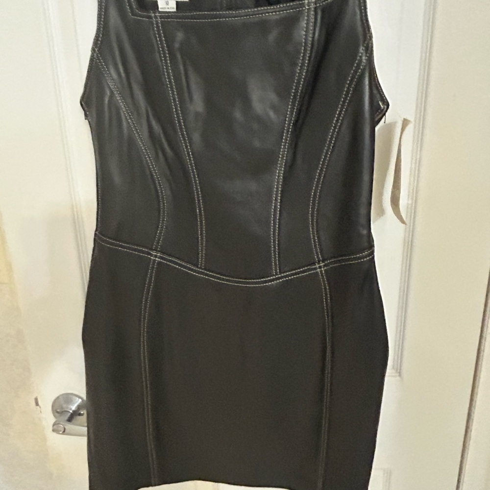Vakko fierce Black Leather dress with lace up back
High quality thick leather